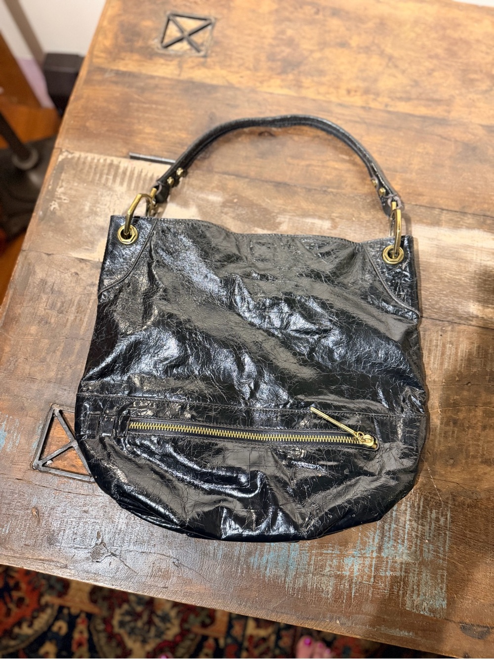 orYany Black Patent Leather Shoulder Bag with Gold Hardware